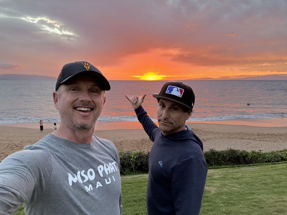 Jeff Igoe at sunset on Maui with a friend